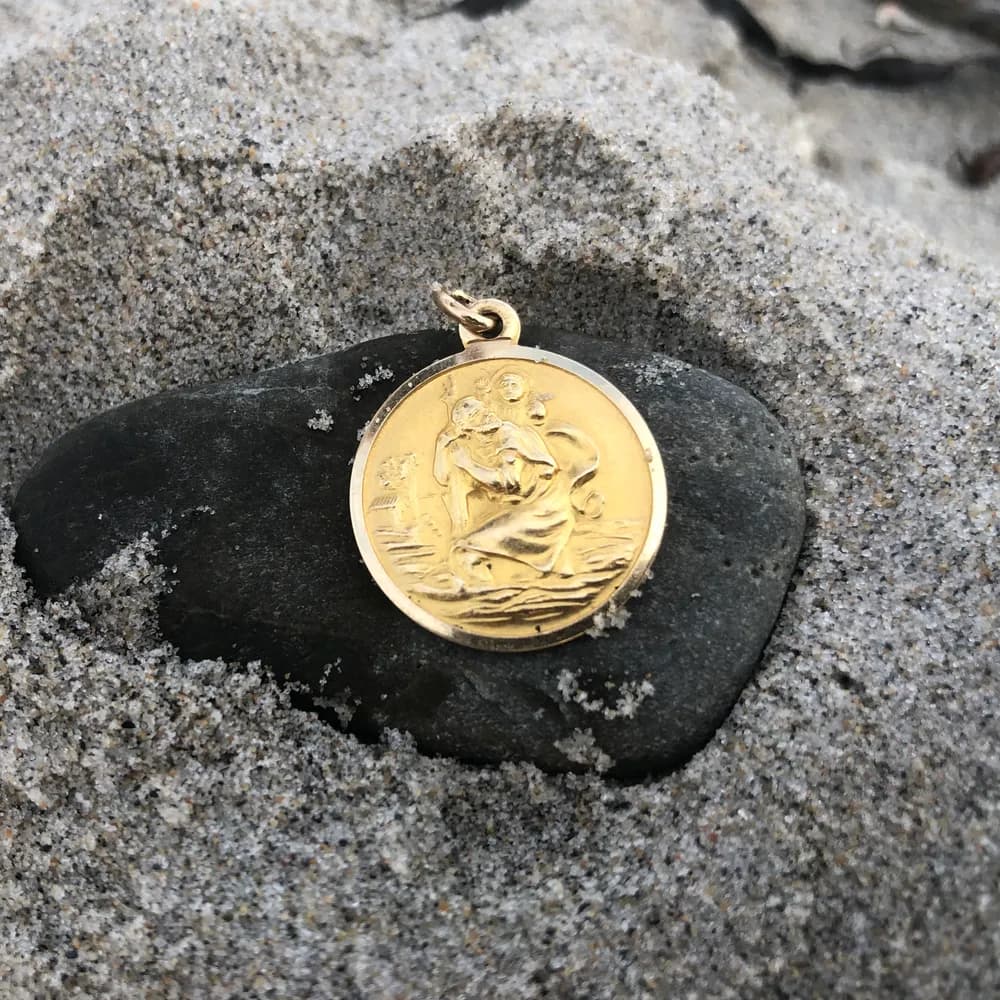 Saint Christopher pendant recovered in the scoop